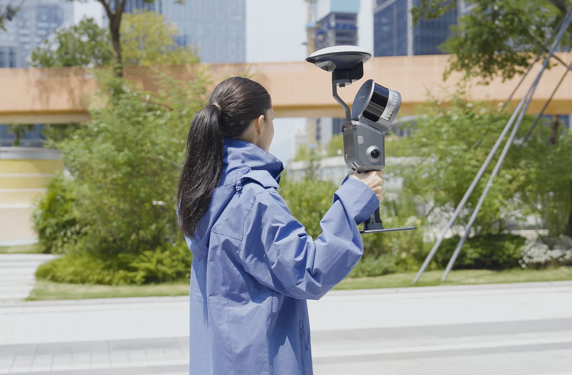 Surveyor scanning a plaza overhead with the Lixel L2 Pro