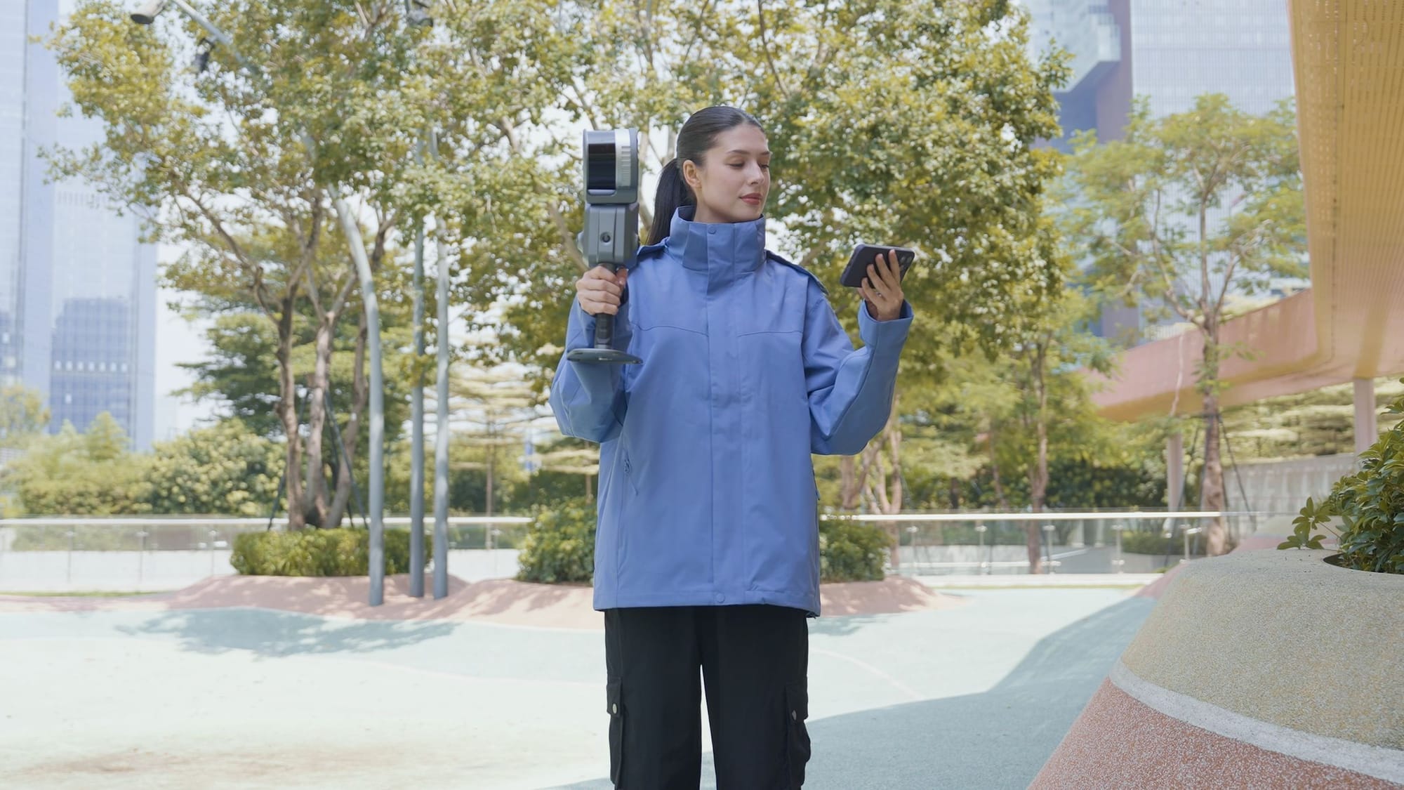 Field technician carrying the Lixel L2 Pro on a shoulder rig