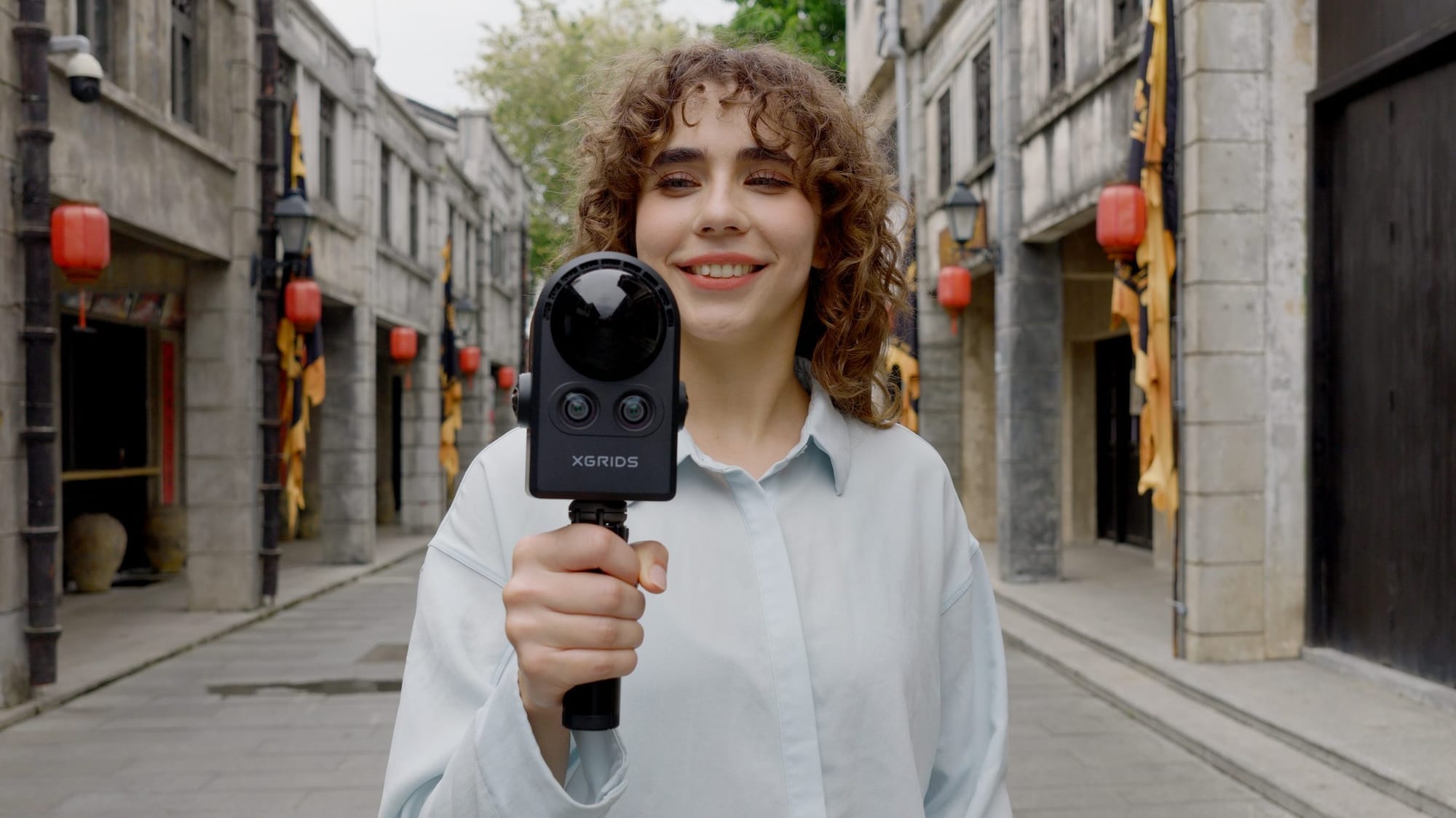 PortalCam held up while capturing a heritage streetscape